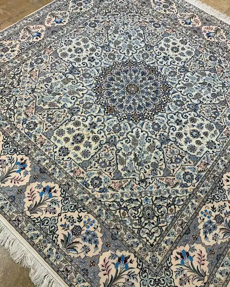 Isfahan Persian Handmade Carpet — Ivory Sapphire Layered Floral Medallion — 220 × 225 cm — angle view