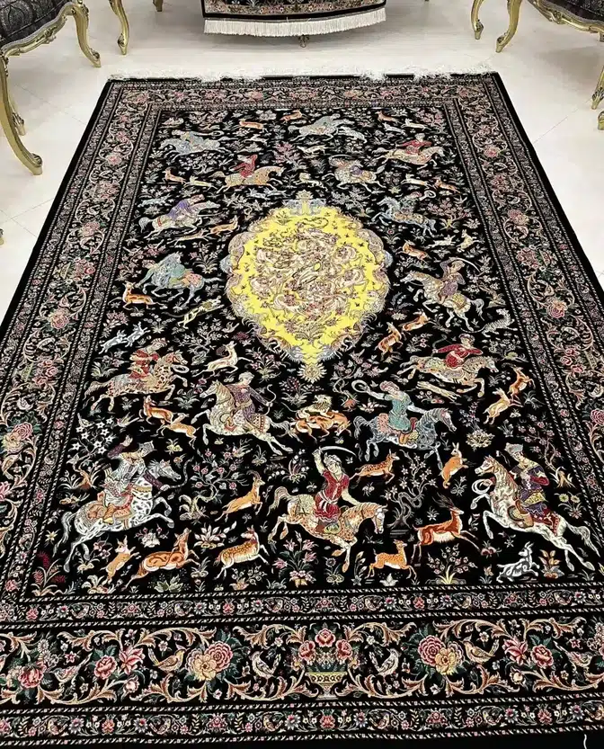 Golden Imperial Hunt handmade Qom pure silk carpet featuring a monumental royal hunting scene centred on a golden medallion, with riders, animals and flowering borders